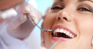 woman getting dental cleaning